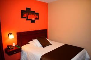 Postel nebo postele na pokoji v ubytování Endamo Hotel