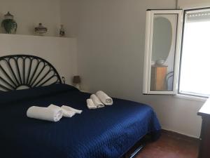 Letto o letti in una camera di Villino Fraginesi