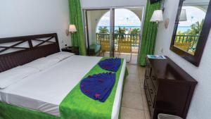 Voodi või voodid majutusasutuse Jolly Beach Antigua - All Inclusive toas