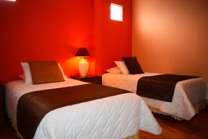 Postel nebo postele na pokoji v ubytování Endamo Hotel