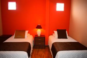 Postel nebo postele na pokoji v ubytování Endamo Hotel