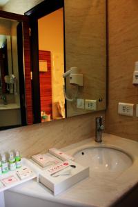 Koupelna v ubytování Hotel Ivory 32