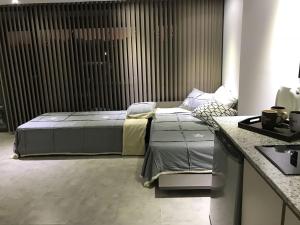 a bedroom with a bed in the corner of a room at Loft & Wines in Maipú