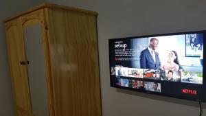 TV a/nebo společenská místnost v ubytování Sunburst