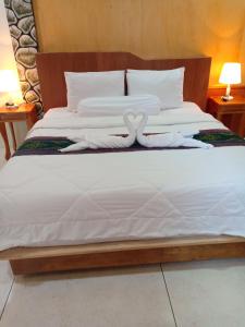 Lara Homestay客房内的一张或多张床位