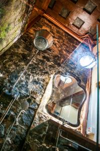 an overhead view of a bathroom with a glass floor at Casa Emblematica Amelia in Santa Cruz de la Palma +32 photos