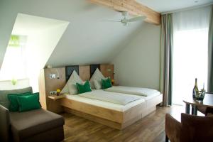 Ein Bett oder Betten in einem Zimmer der Unterkunft Pension Sperlhof