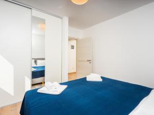 Łóżko lub łóżka w pokoju w obiekcie Appartments Adriatic