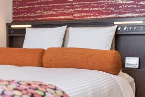 Postel nebo postele na pokoji v ubytování HOTEL MYSTAYS Kyoto Shijo
