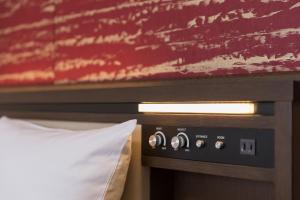 Postel nebo postele na pokoji v ubytování HOTEL MYSTAYS Kyoto Shijo