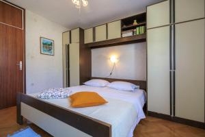 Postel nebo postele na pokoji v ubytování Apartment Mamma Mia