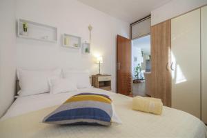 Postel nebo postele na pokoji v ubytování Apartment Mamma Mia