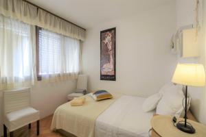 Postel nebo postele na pokoji v ubytování Apartment Mamma Mia