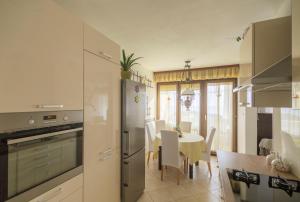 Kuchyň nebo kuchyňský kout v ubytování Apartment Mamma Mia + 26 fotografií