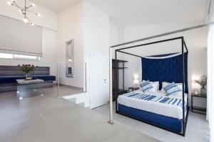 Säng eller sängar i ett rum på Aloe Boutique Hotel & Suites - adults only