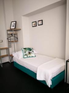 Cama o camas de una habitación en Loraia Design Rooms