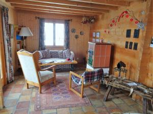 a living room with a couch and a table at Chalet Blettner in Randa