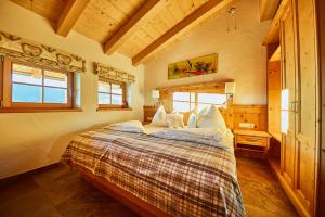 Posteľ alebo postele v izbe v ubytovaní Wallegg Lodge - Alpine Premium Chalet - Ski In-Ski Out - Real Alpine Location Saalbach
