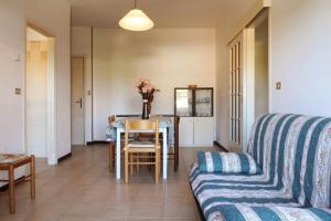 a living room with a couch and a table at Silville in Silvi Marina