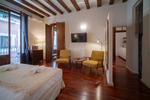 Postel nebo postele na pokoji v ubytování Habitat Apartments Ferran