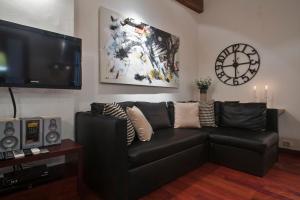 TV a/nebo společenská místnost v ubytování Habitat Apartments Ferran