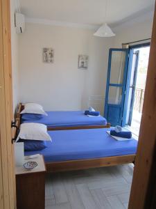 Postel nebo postele na pokoji v ubytování Fig Leaf House