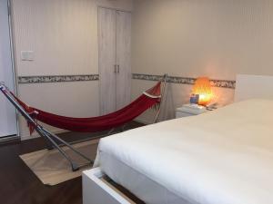 Un pat sau paturi într-o cameră la Business Hotel La Firenze