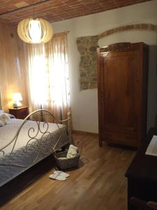 Posteľ alebo postele v izbe v ubytovaní Cascina Maina