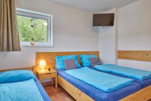 Postel nebo postele na pokoji v ubytování Skipension + 22 fotografií
