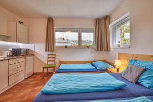 Postel nebo postele na pokoji v ubytování Skipension