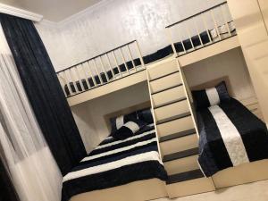 Llit o llits en una habitació de Hotell Anna Ureki