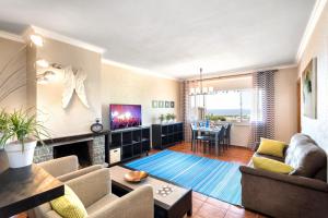 Televízia a/alebo spoločenská miestnosť v ubytovaní Costa Maresme Apartment