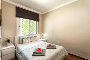 Posteľ alebo postele v izbe v ubytovaní Costa Maresme Apartment