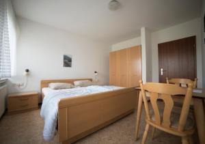 Postel nebo postele na pokoji v ubytování Ferienhaus Vulkaneifel Kopp