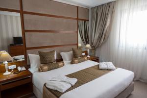 Marigold Hotel客房内的一张或多张床位