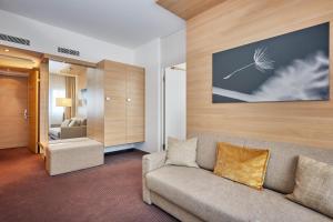 Гостиная зона в H+ Hotel Zürich