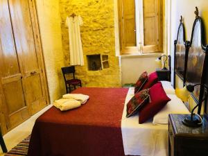 Postel nebo postele na pokoji v ubytování Borgo in corte