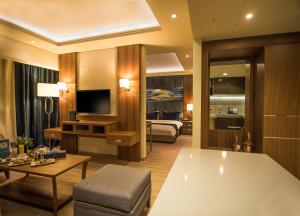 TV o dispositivi per l'intrattenimento presso Gems Hotel