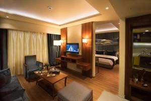 TV o dispositivi per l'intrattenimento presso Gems Hotel