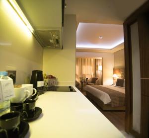Letto o letti in una camera di Gems Hotel