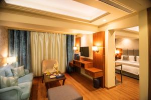 Letto o letti in una camera di Gems Hotel