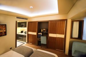 Letto o letti in una camera di Gems Hotel