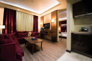 TV o dispositivi per l'intrattenimento presso Gems Hotel