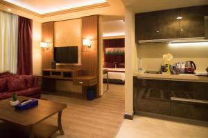 TV o dispositivi per l'intrattenimento presso Gems Hotel