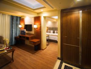 Letto o letti in una camera di Gems Hotel