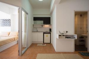 Kuchyň nebo kuchyňský kout v ubytování Avatara Condo B24 by malai