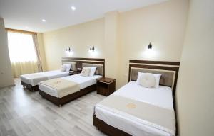 Postel nebo postele na pokoji v ubytování Hotel 725 B + 34 fotografií