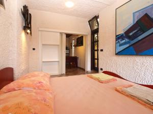 Posteľ alebo postele v izbe v ubytovaní Apartments Nenad 1720