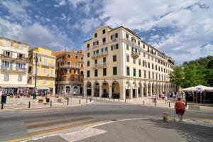 a group of buildings on a city street at Bonagrazia in Corfu Town