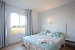 Posteľ alebo postele v izbe v ubytovaní BJ Playamar Hotel & Apartamentos